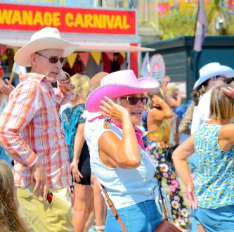 Two fabulous Flashmob dancers wear cowboy hats in the swanage carnival.